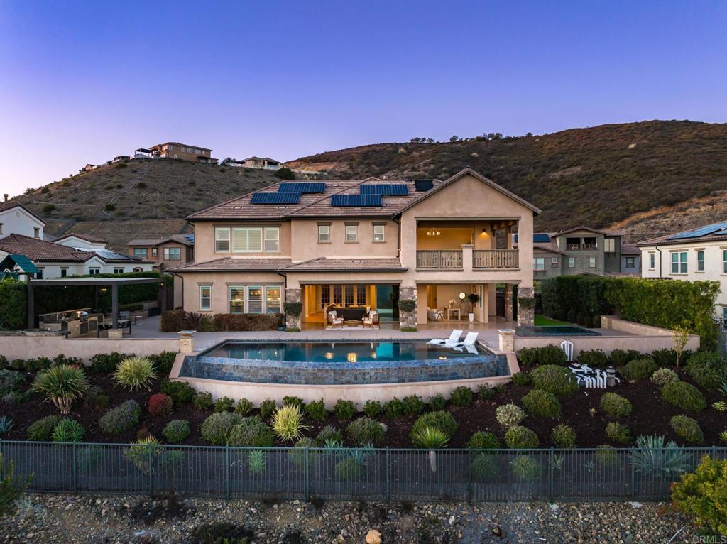 546 Ledge Street San Marcos, CA 92078 - Photo 69 of 75 a front view of a house with a garden