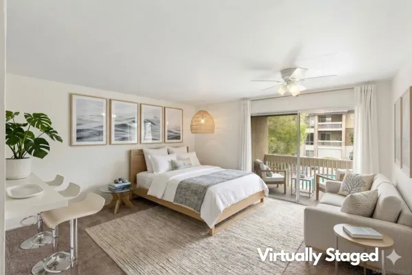 a bedroom with a large bed and a couch