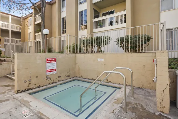a view of a building with a swimming pool