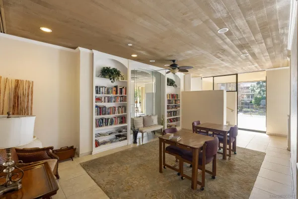 a view of a dining room with furniture window and outside view