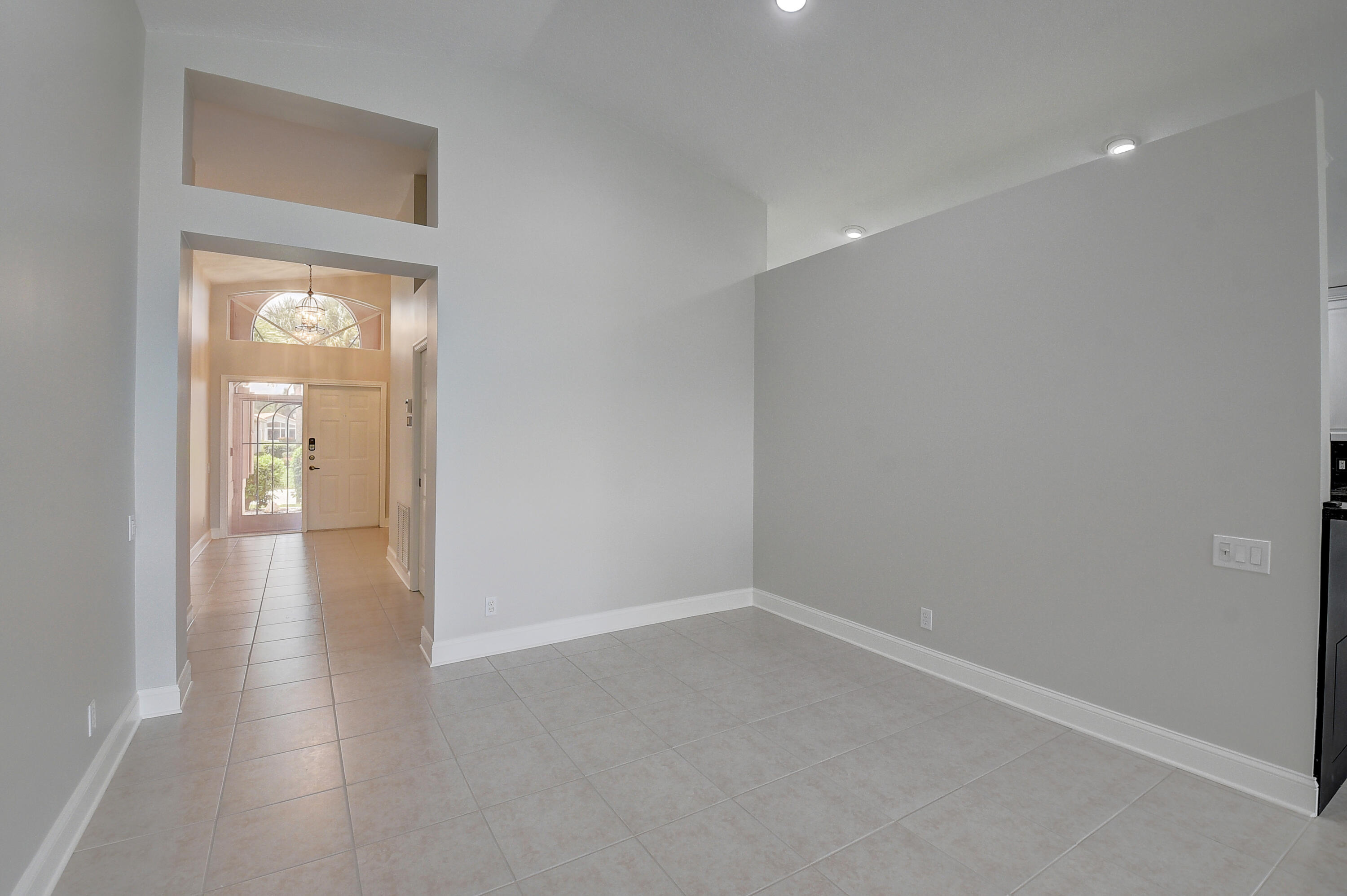 6670 Maybrook Road Boynton Beach, FL 33437 - Photo 12 of 72 a view of a hallway with wooden floor
