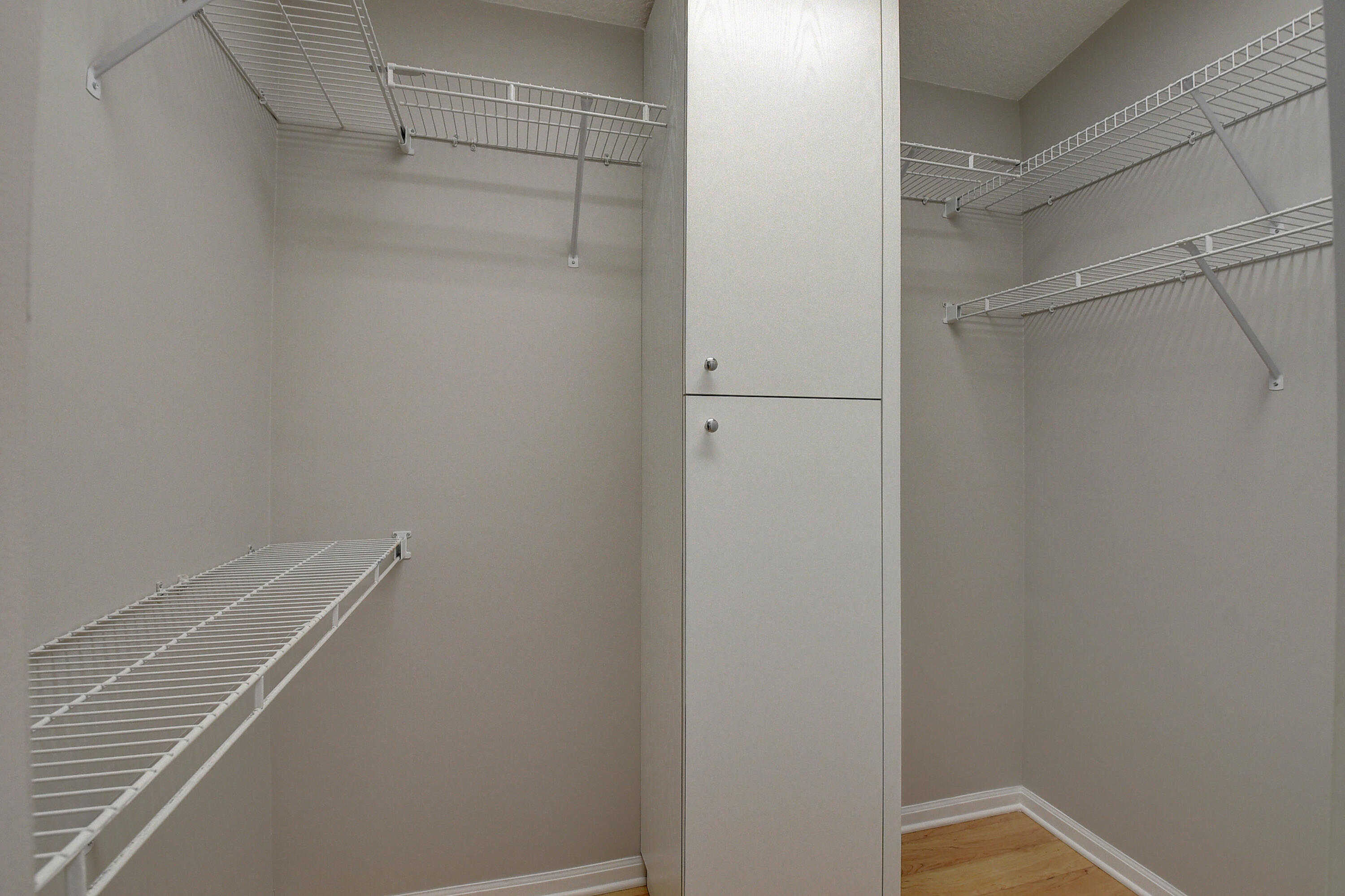 6670 Maybrook Road Boynton Beach, FL 33437 - Photo 17 of 72 a view of a room with racks on the wall