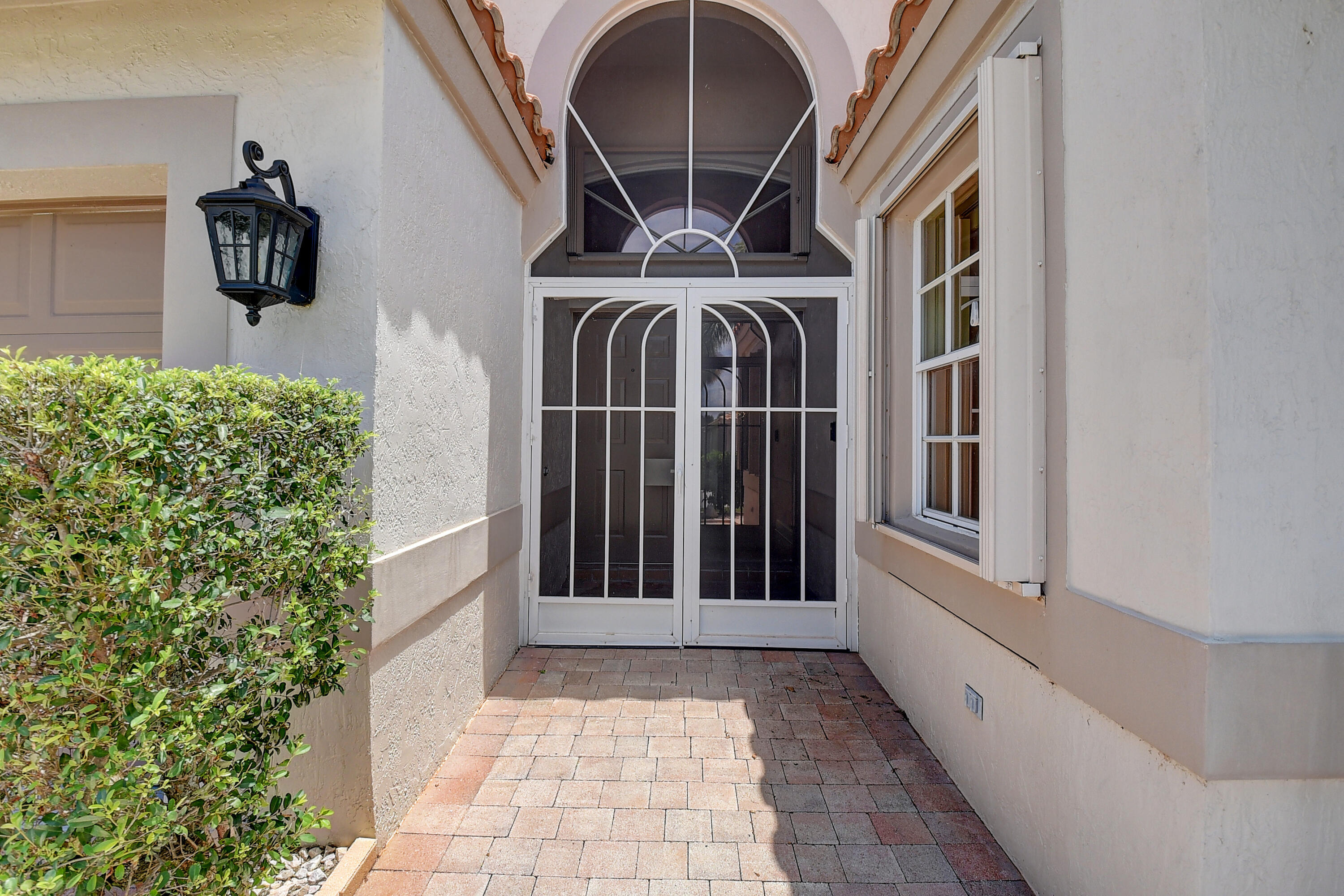 6670 Maybrook Road Boynton Beach, FL 33437 - Photo 28 of 72 a view of entryway with a front door