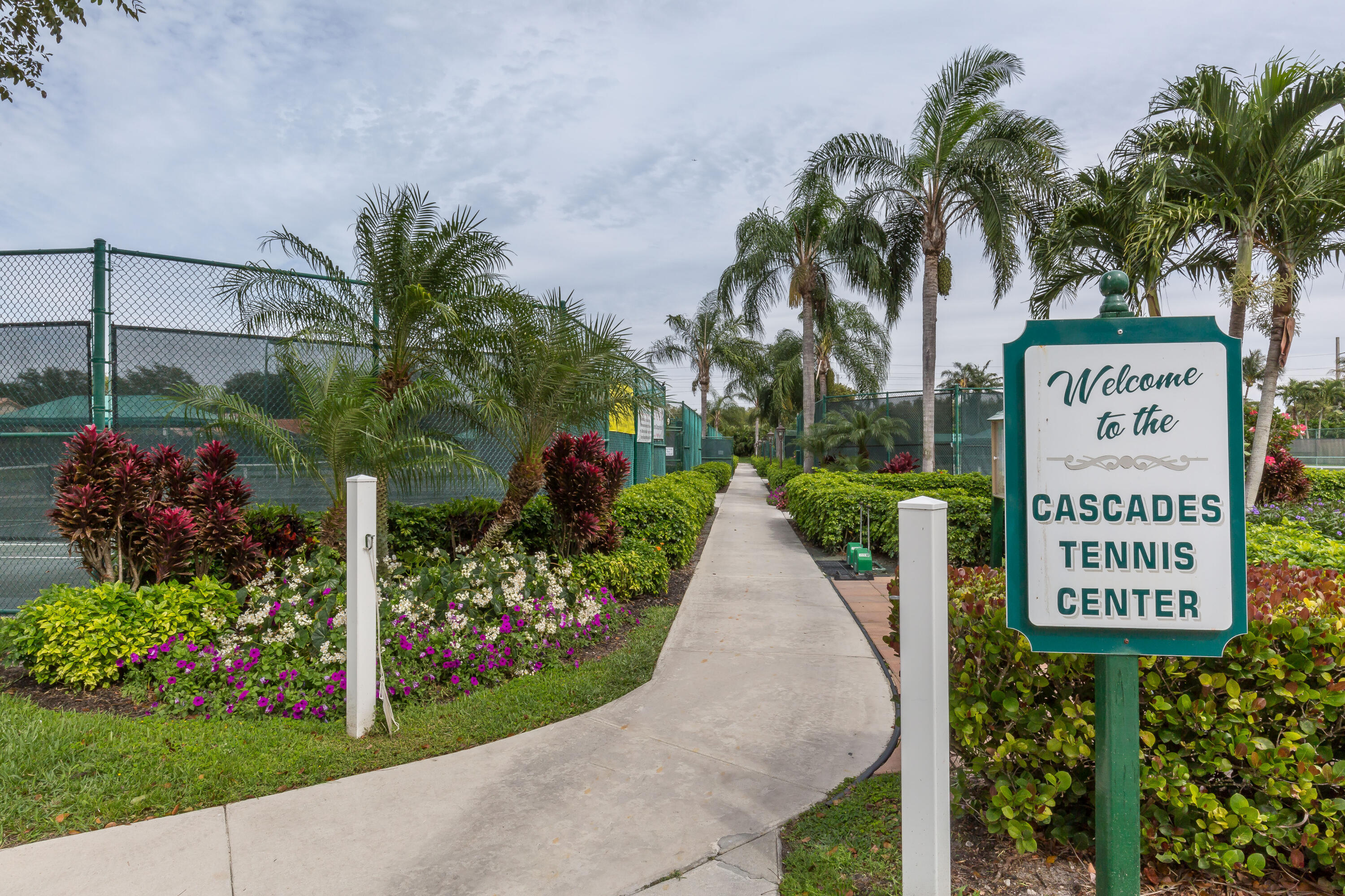 6670 Maybrook Road Boynton Beach, FL 33437 - Photo 56 of 72 a view of a sign in front of flowers