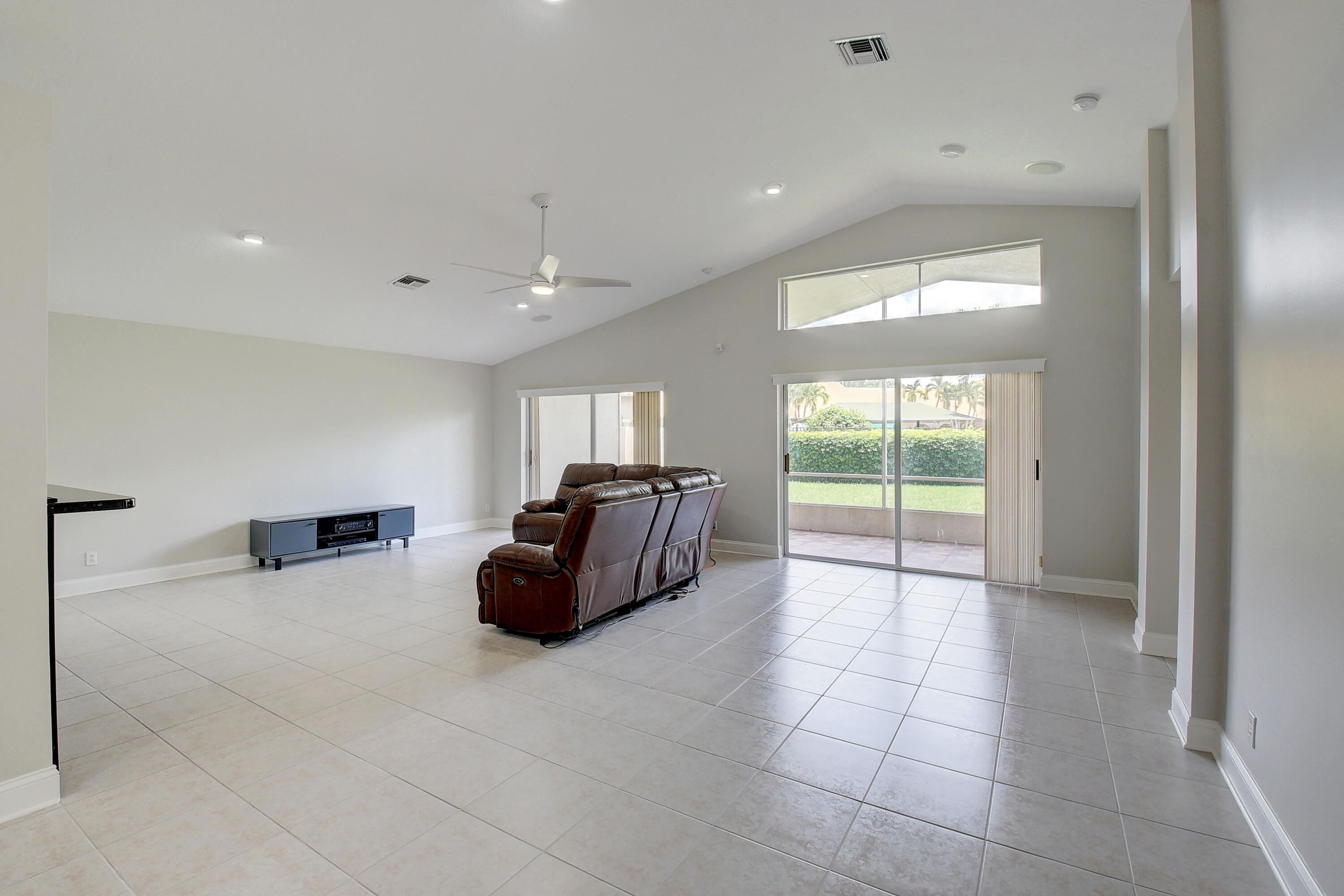 6670 Maybrook Road Boynton Beach, FL 33437 - Photo 7 of 72 a room with furniture and a window