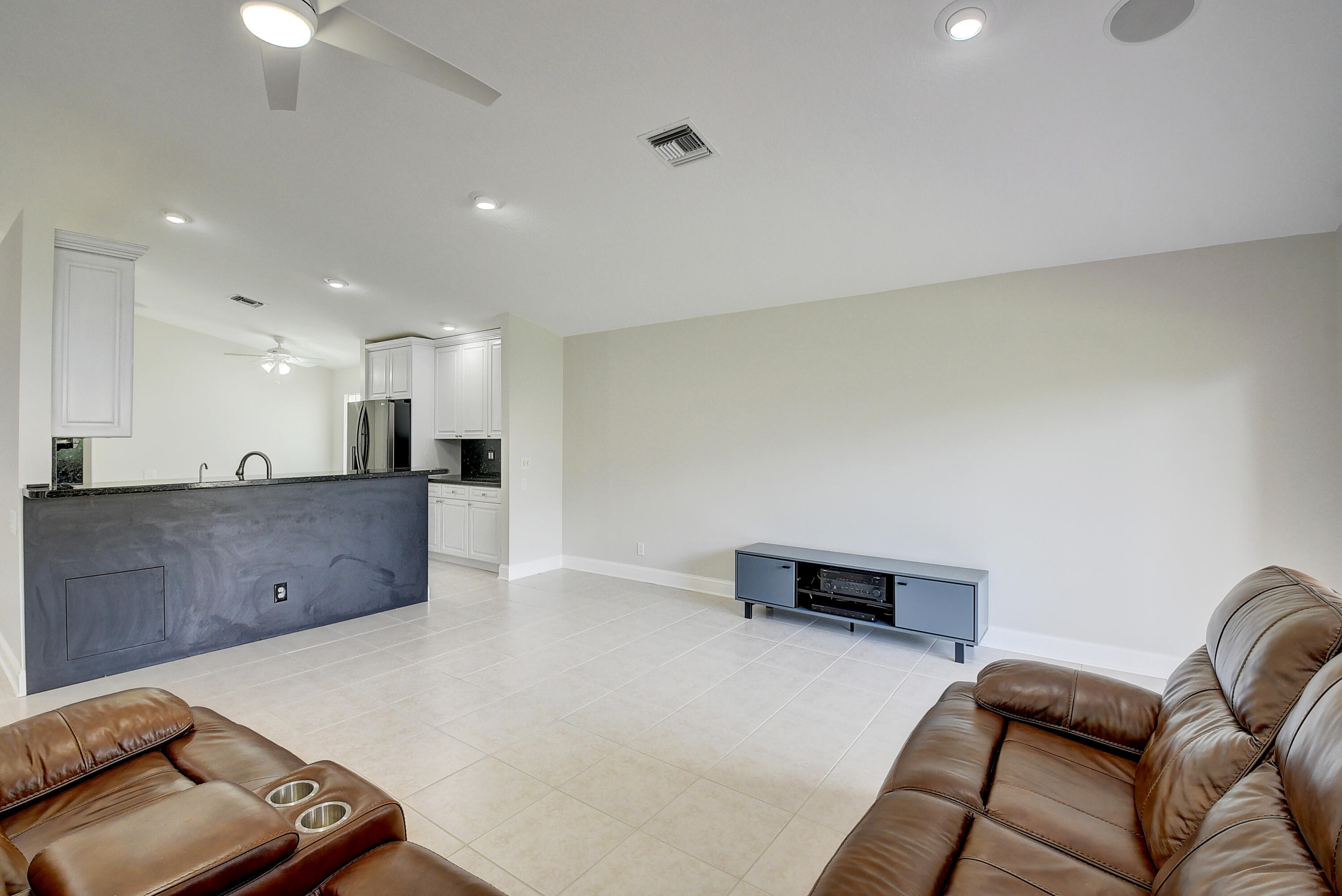 6670 Maybrook Road Boynton Beach, FL 33437 - Photo 9 of 72 a living room with furniture