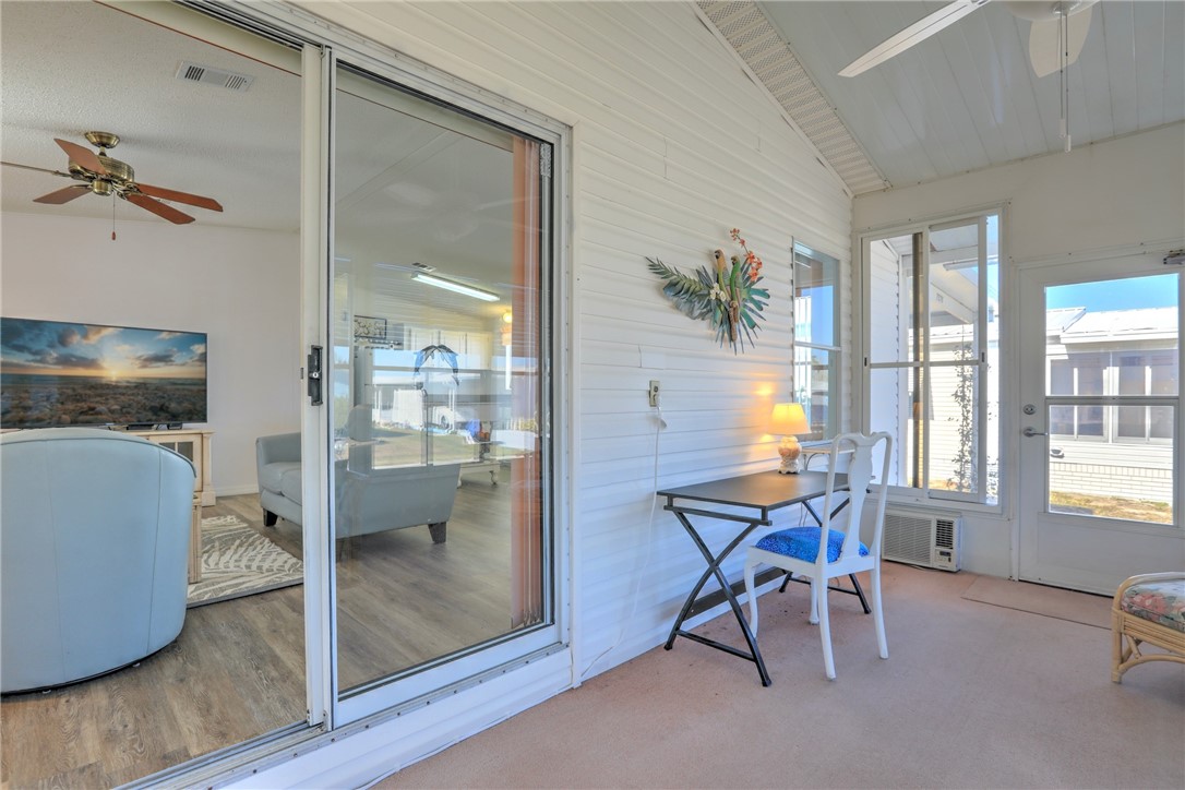 7576 Chasta Road Micco, FL 32976 - Photo 16 of 27 a workspace with furniture and windows