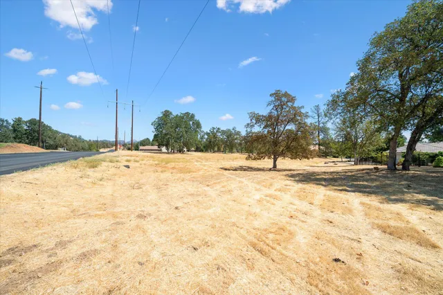 a view of yard covered with snow
