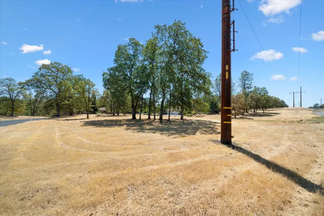 a view of road with trees