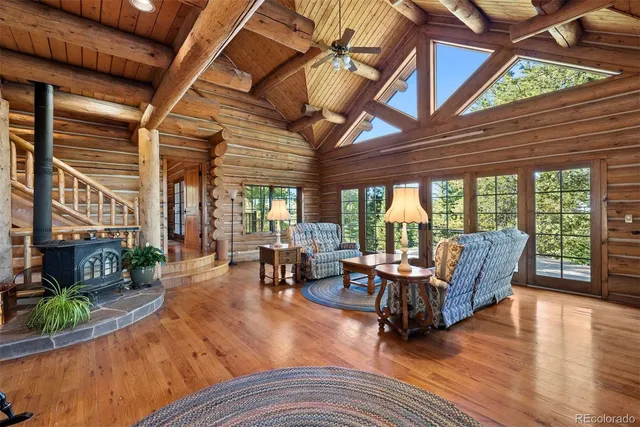 a outdoor space with patio lots of furniture and wooden floors