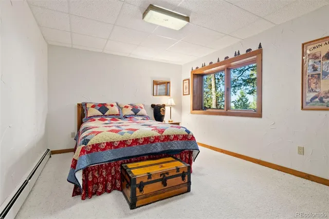 a view of a garage with a bike and car