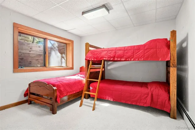 a backyard of a house with yard and outdoor seating