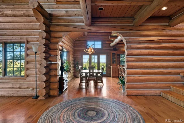 a view of entryway with livingroom and stairs