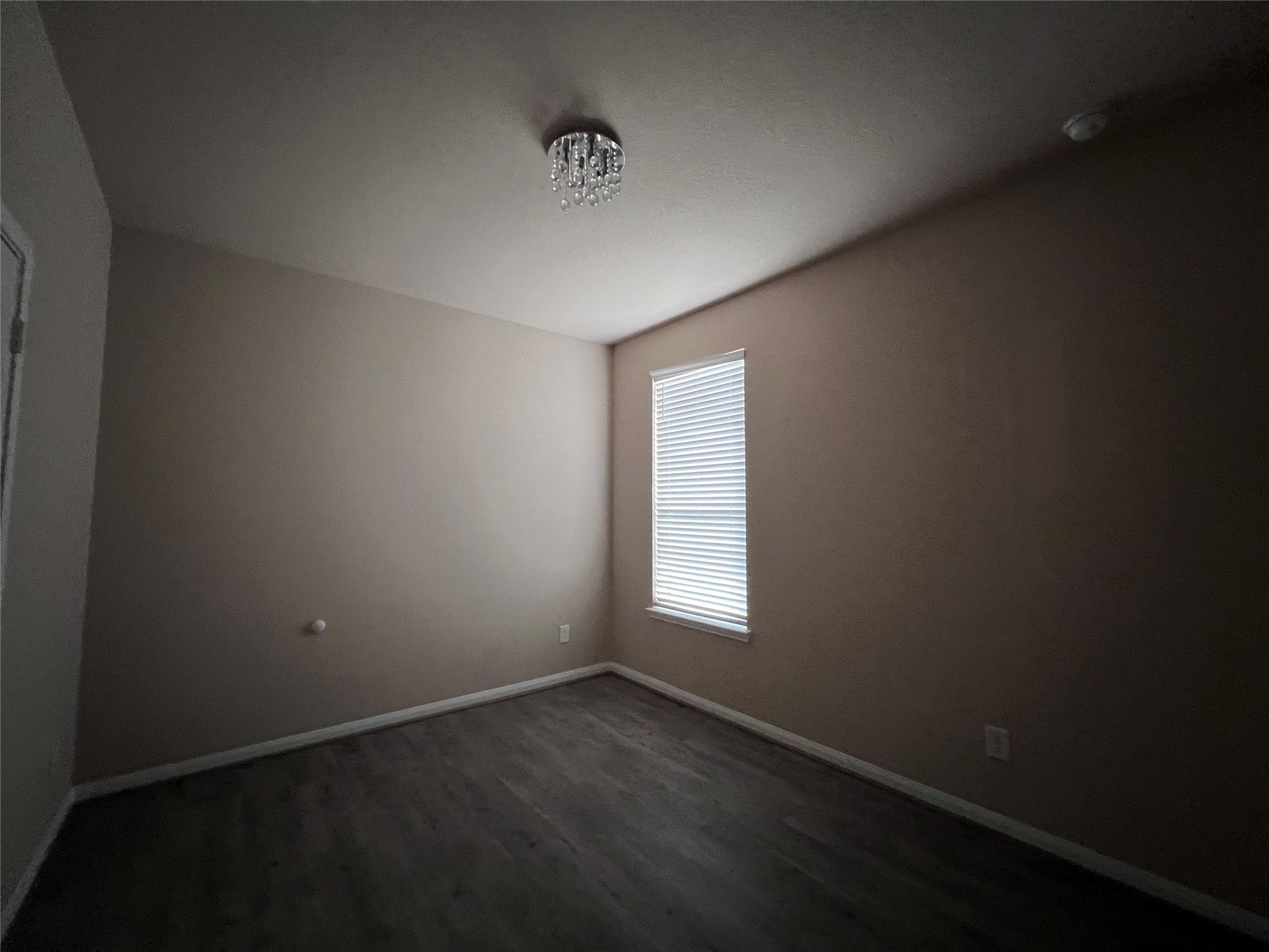 7703 Lehman Road Beasley, TX 77417 - Photo 10 of 17 a view of an empty room with a window