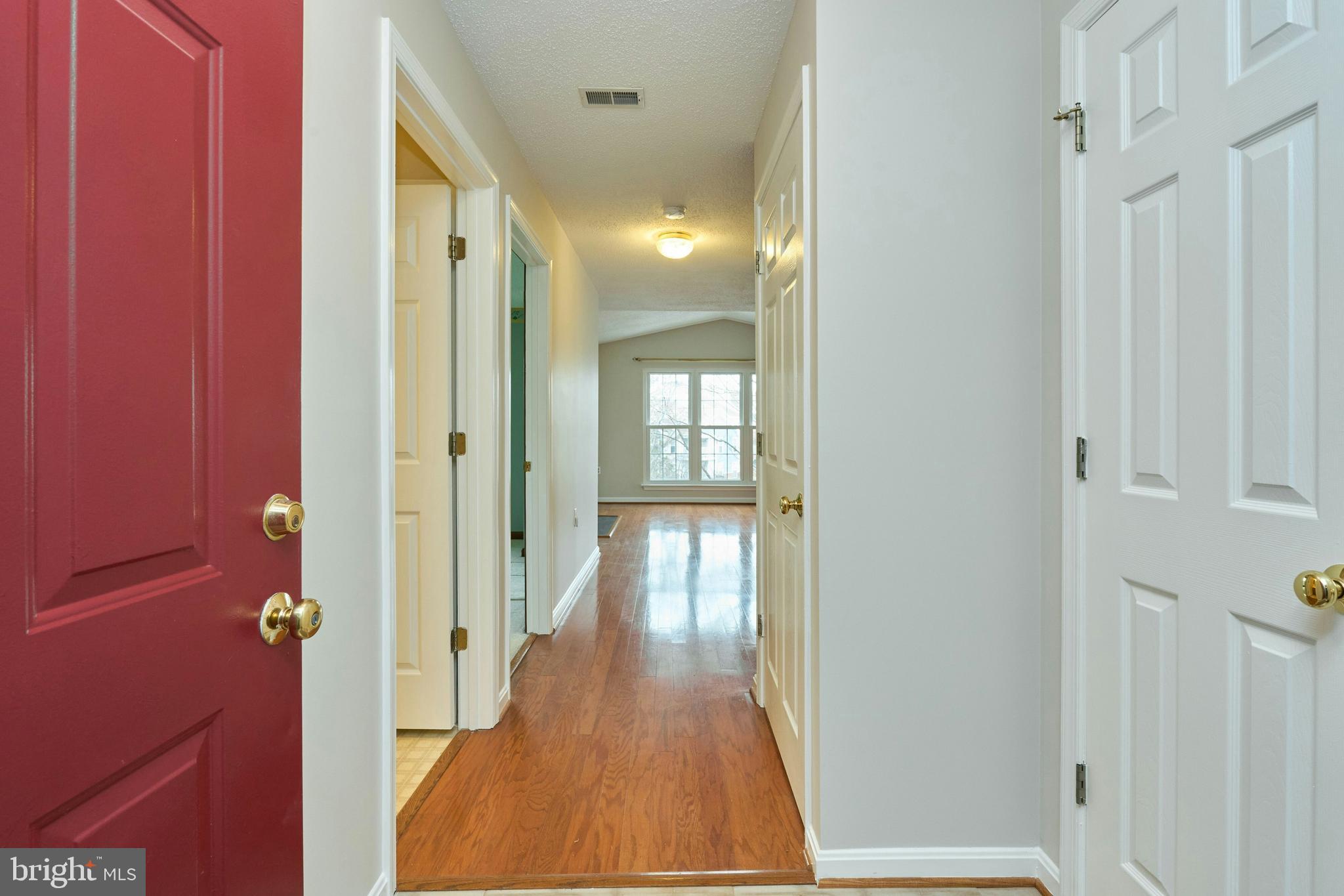21014 Timber Ridge Terrace, Unit 302 Ashburn, VA 20147 - Photo 15 of 32 a view of gallery with wooden floor
