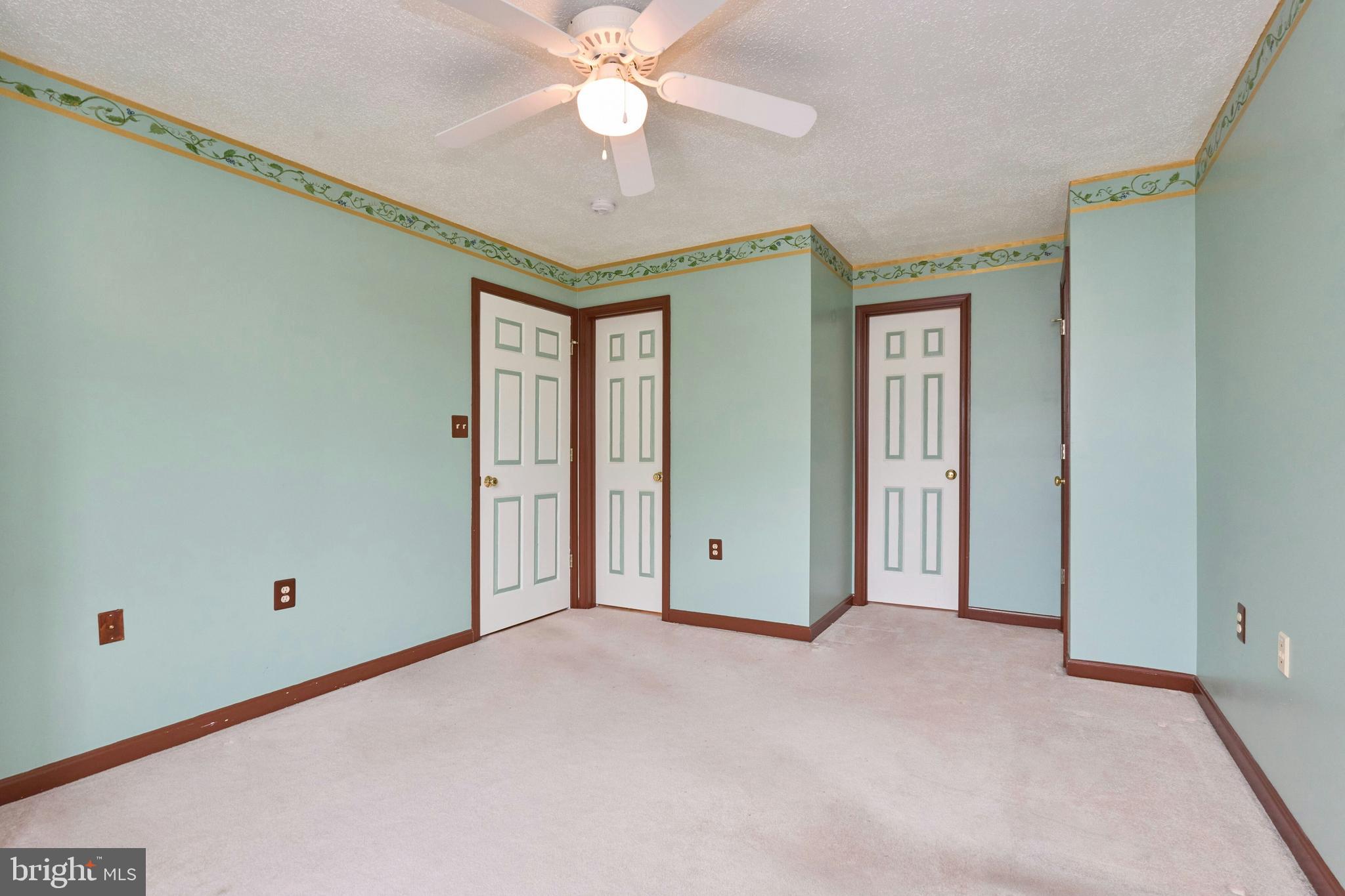 21014 Timber Ridge Terrace, Unit 302 Ashburn, VA 20147 - Photo 27 of 32 a view of an empty room with a window