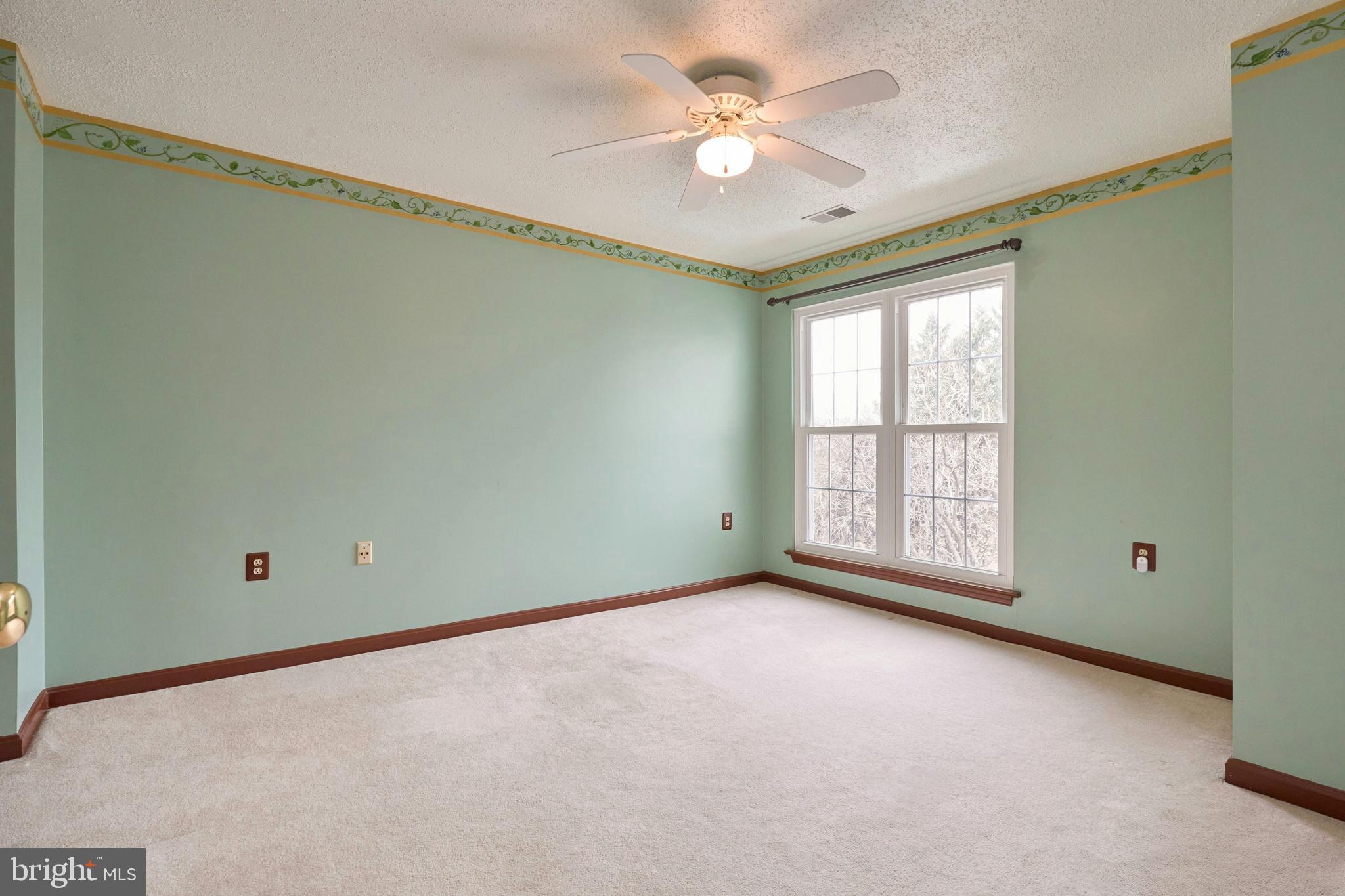21014 Timber Ridge Terrace, Unit 302 Ashburn, VA 20147 - Photo 28 of 32 a view of an empty room with a window