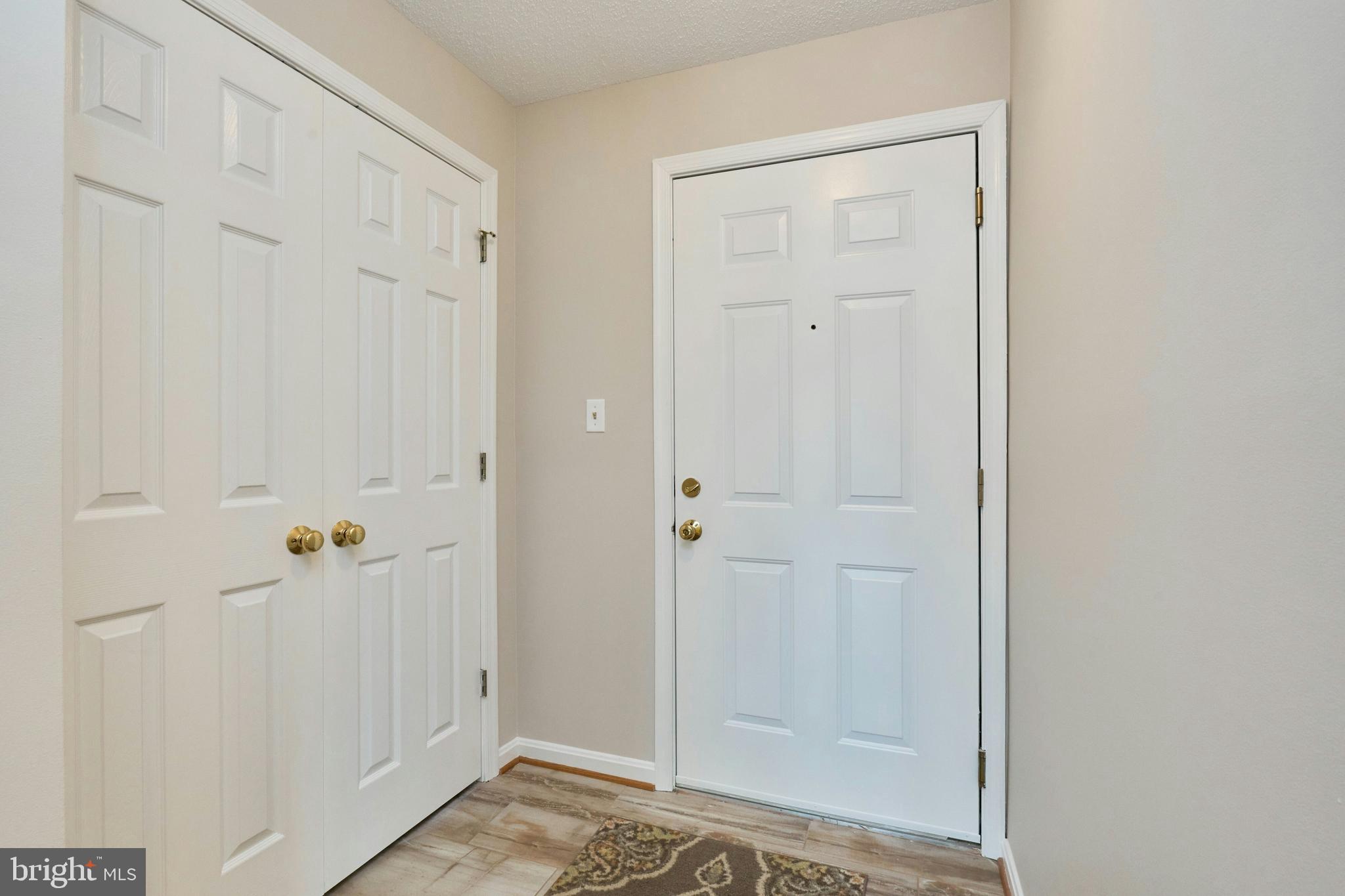 21014 Timber Ridge Terrace, Unit 302 Ashburn, VA 20147 - Photo 30 of 32 a view of room with walk in closet