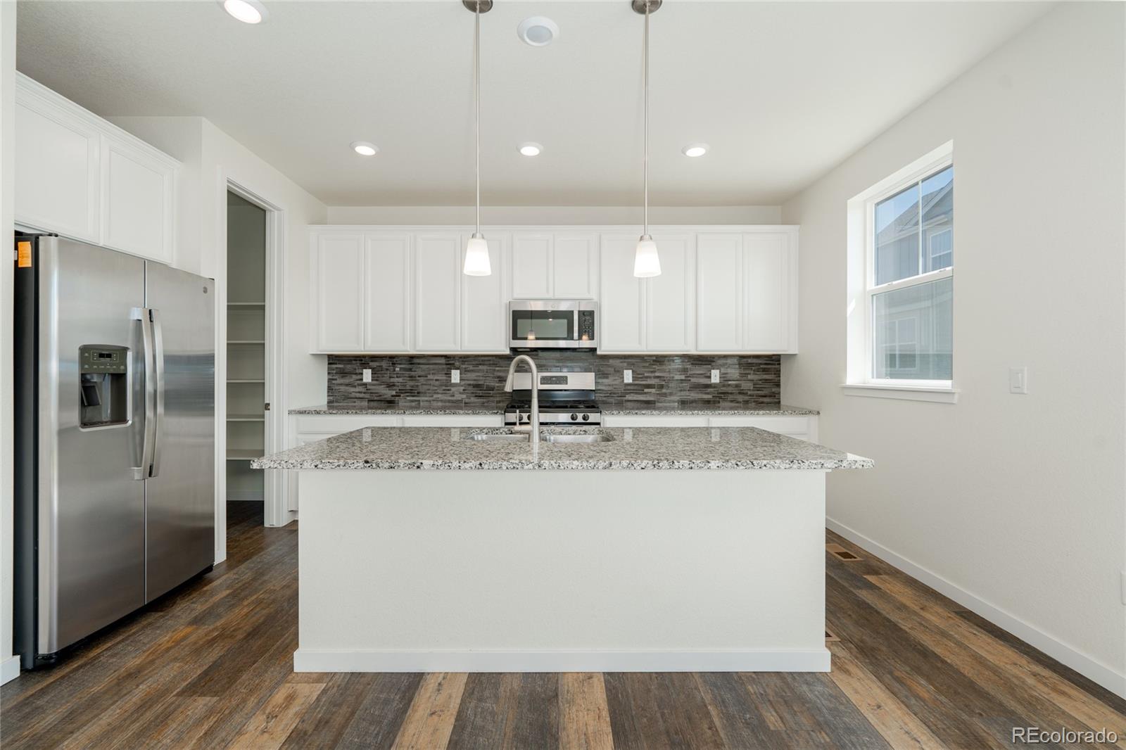 10962 Vaughn Street Commerce City, CO 80022 - Photo 4 of 22