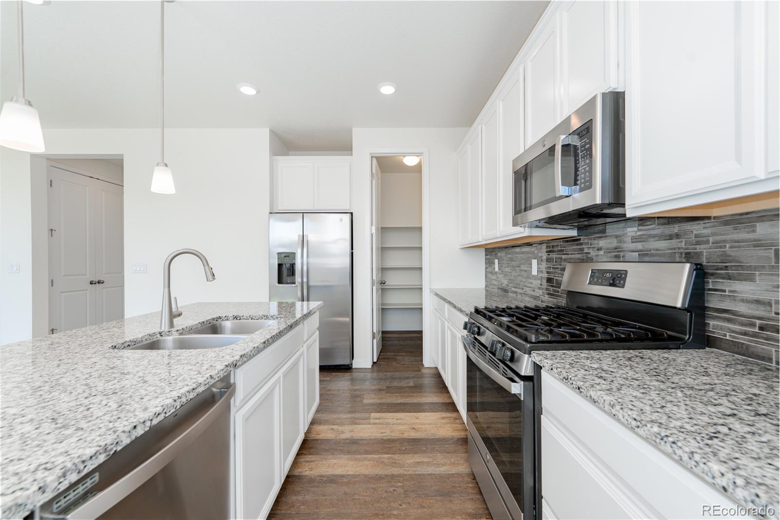 10962 Vaughn Street Commerce City, CO 80022 - Photo 6 of 22