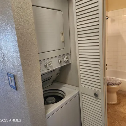 a bathroom with a sink and toilet