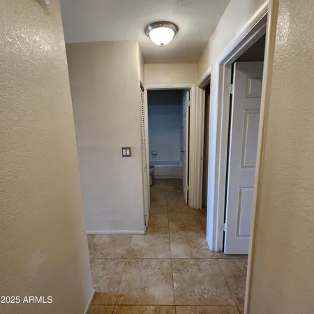 a view of a hallway with a elevator