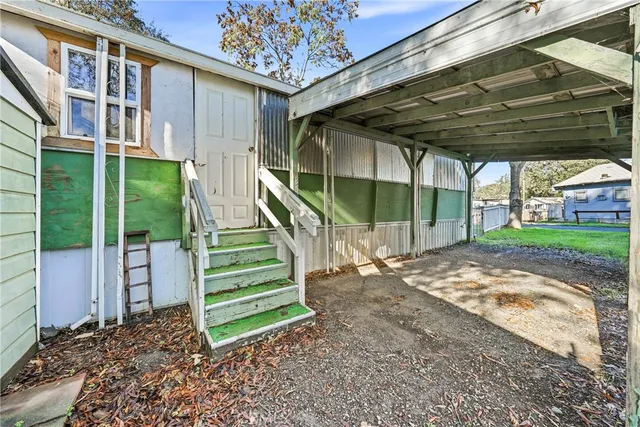 a view of outdoor space with wooden deck