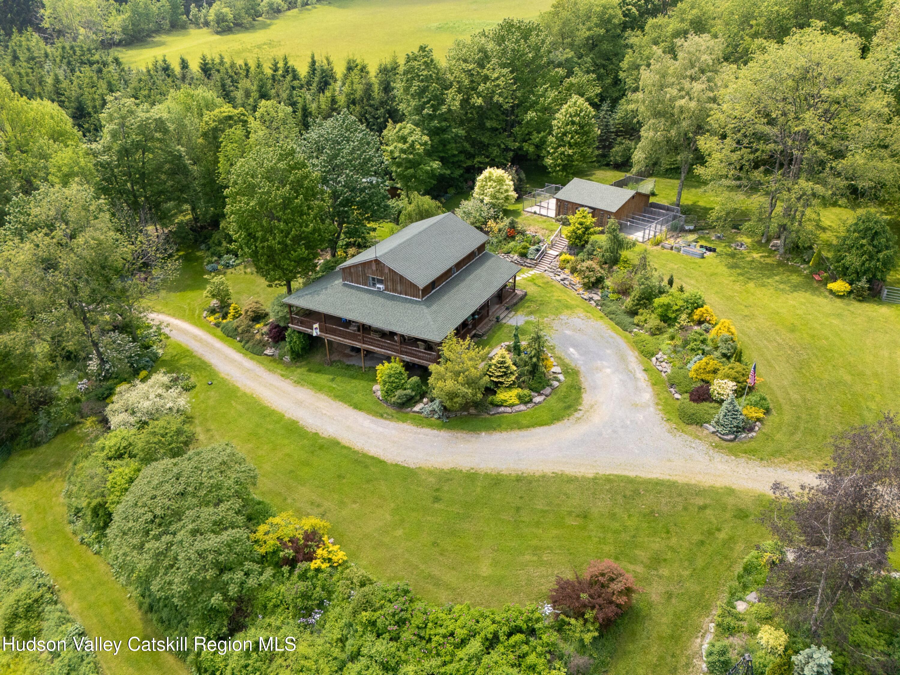 a view of a back yard with green space