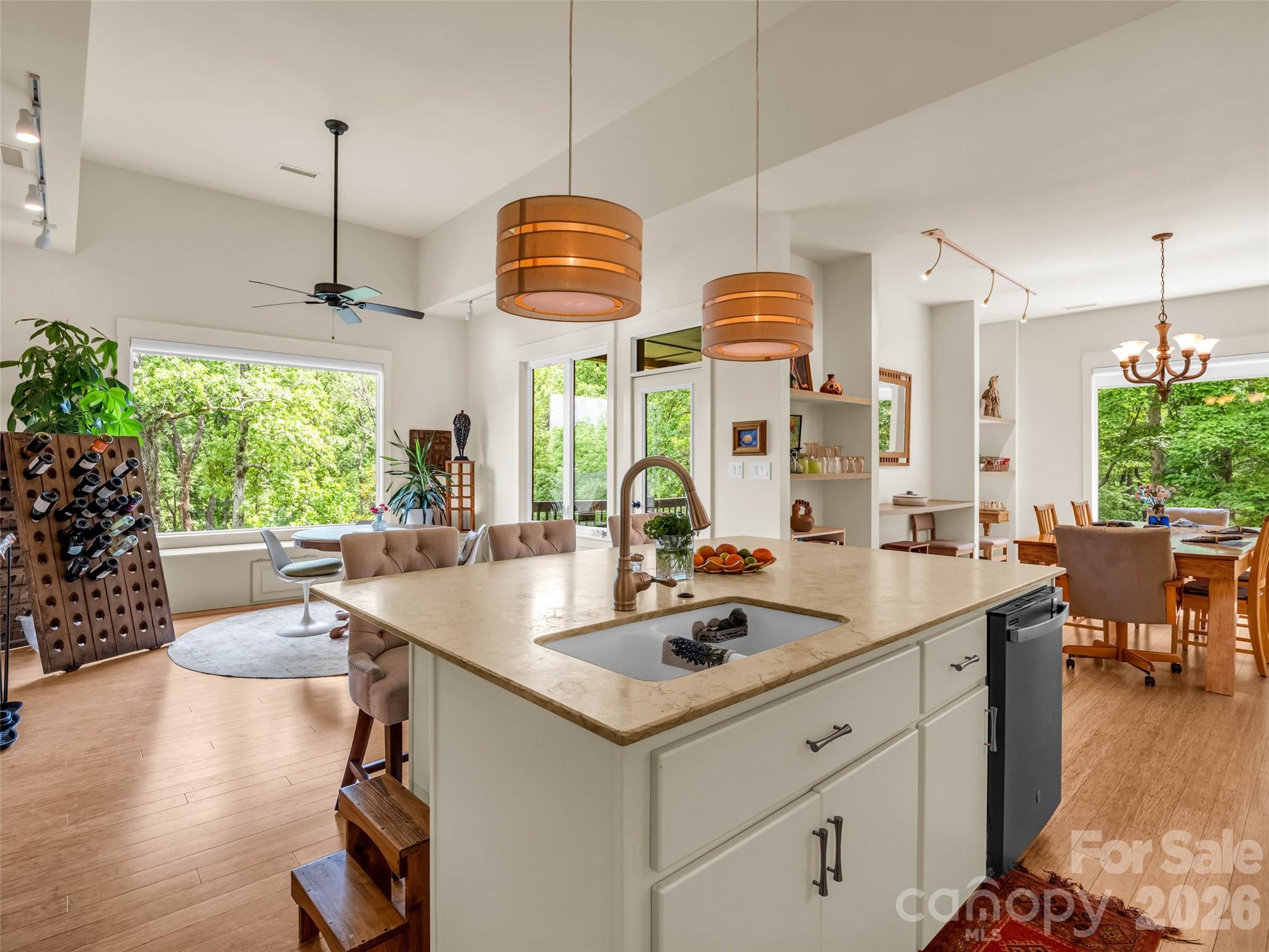 120 Glenn Court Mill Spring, NC 28756 - Photo 17 of 48 a kitchen with center island table and chairs