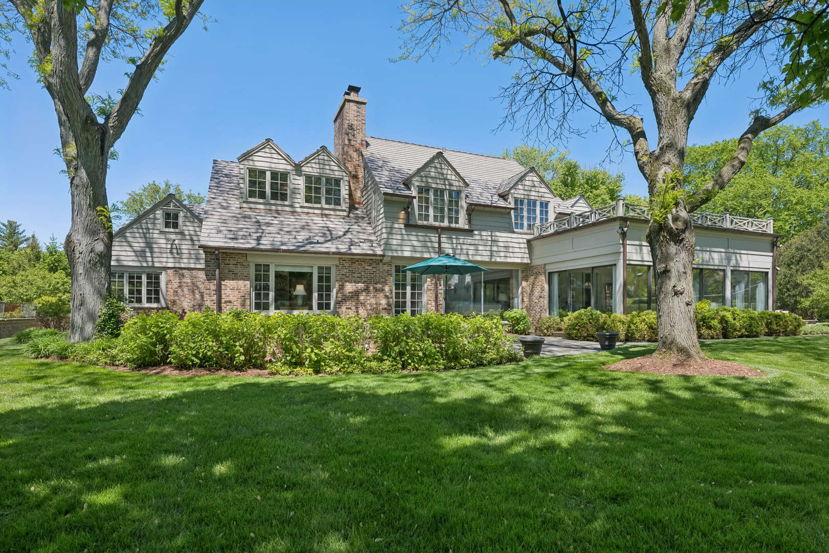 936 Sunset Road Winnetka, IL 60093 - Photo 48 of 50 a front view of a house with a yard