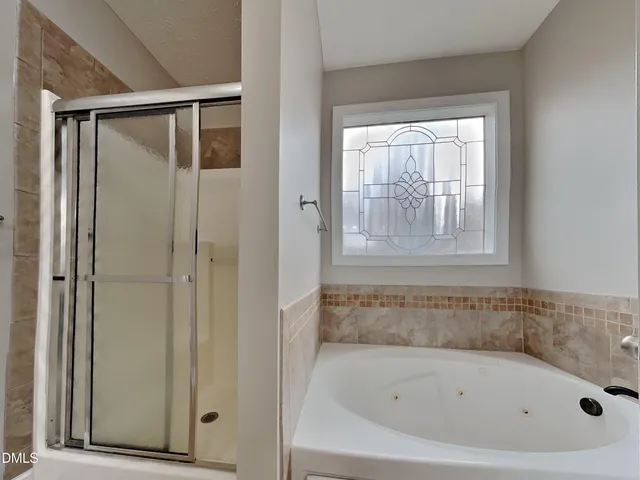 a bathroom with a bathtub