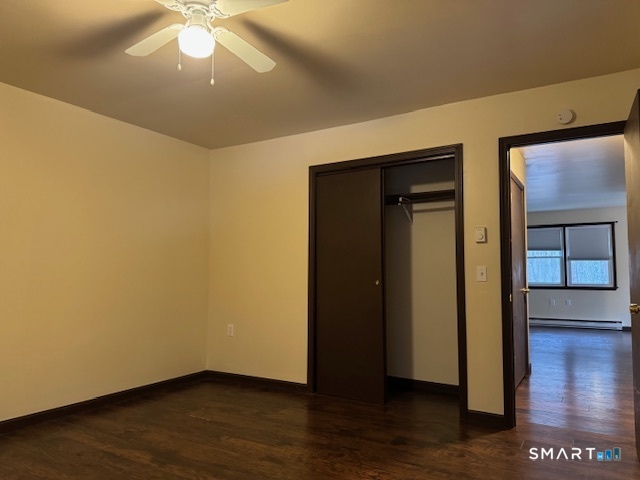 472 Cow Hill Road Groton, CT 06355 - Photo 10 of 11 an empty room with wooden floor and closet