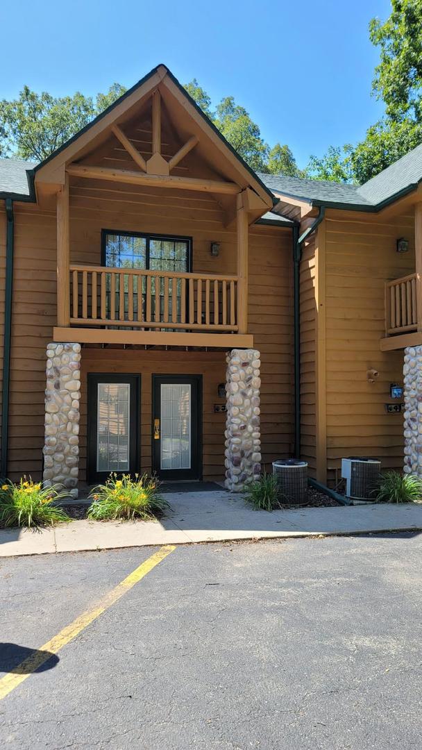 2643 North Il Route 178, Unit Q3 Utica, IL 61373 - Photo 1 of 10 a front view of a house with a yard