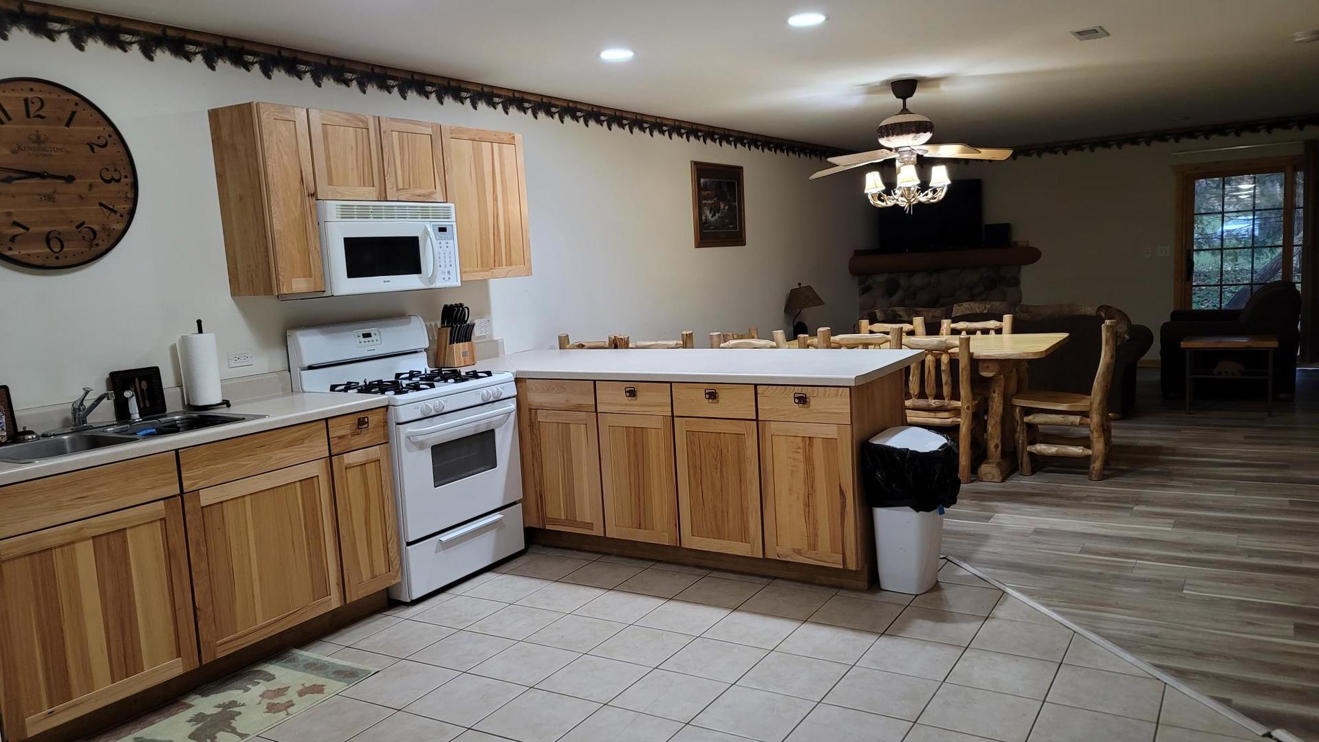 2643 North Il Route 178, Unit Q3 Utica, IL 61373 - Photo 2 of 10 a kitchen with a cabinets and chairs