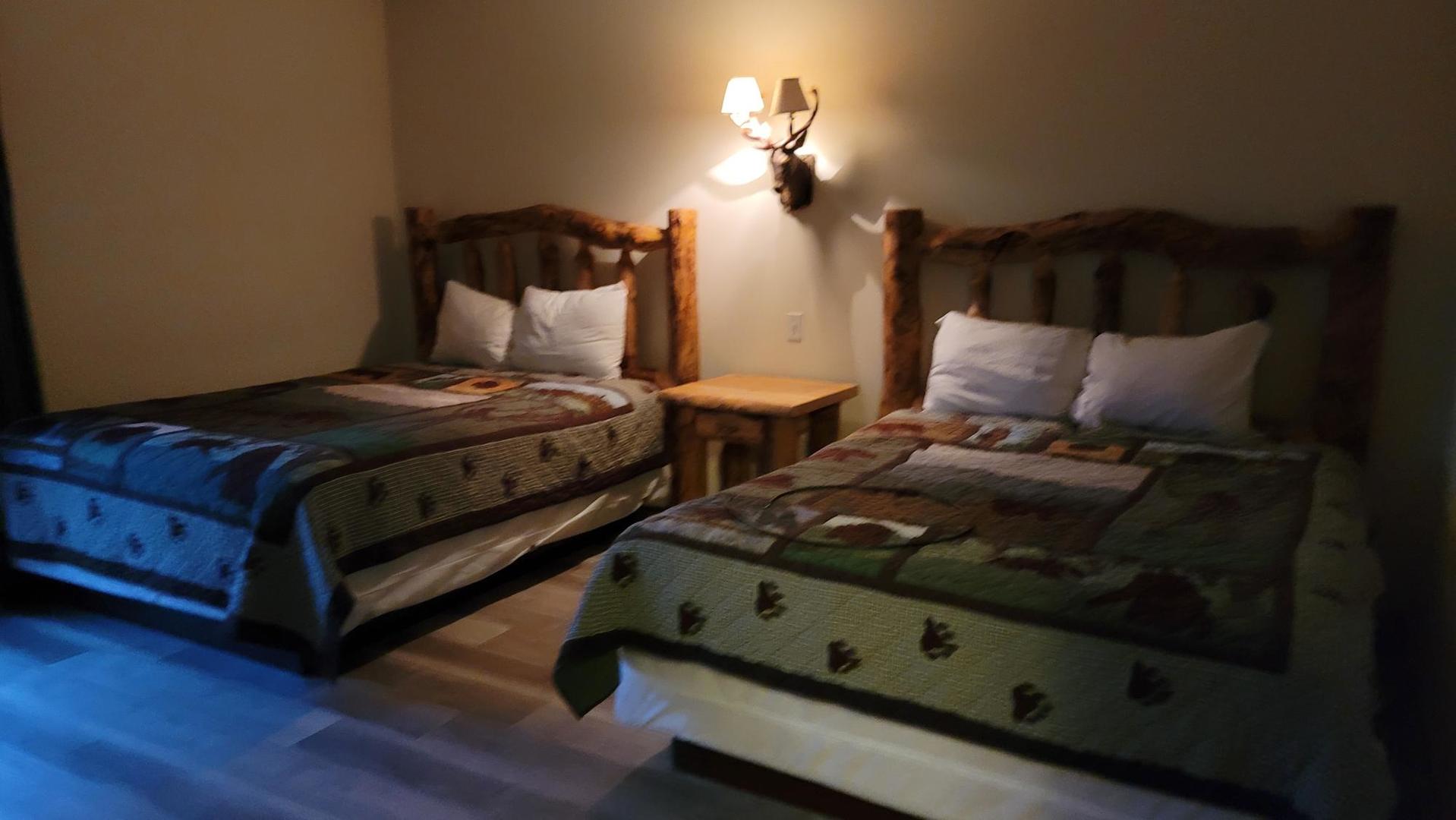 2643 North Il Route 178, Unit Q3 Utica, IL 61373 - Photo 5 of 10 a bed room with bed and a night stand