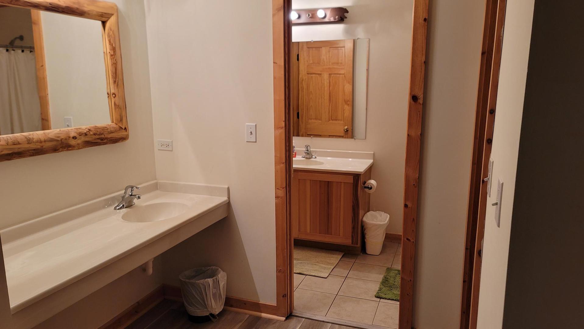 2643 North Il Route 178, Unit Q3 Utica, IL 61373 - Photo 9 of 10 a bathroom with a sink and a mirror