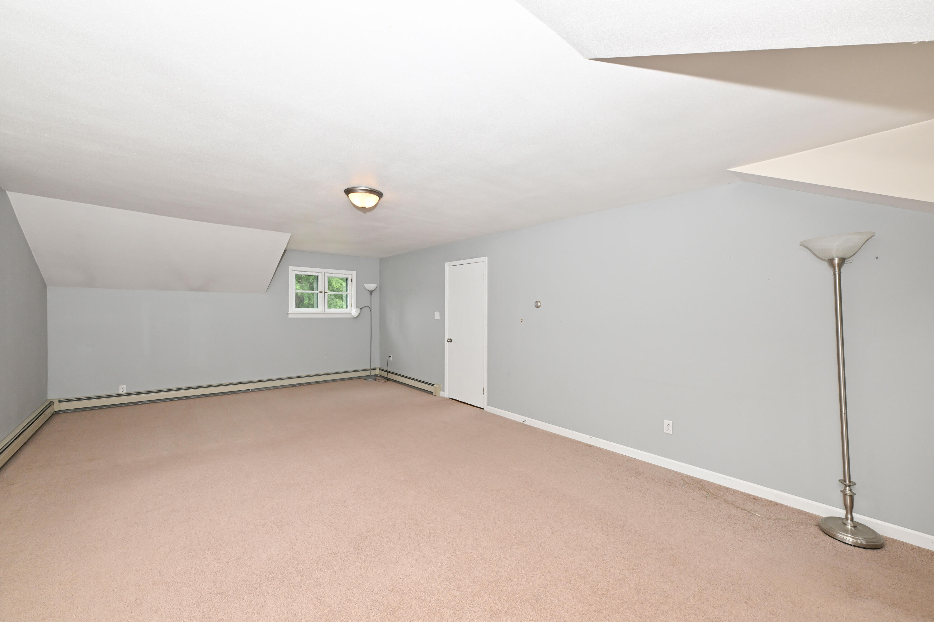 1933 West Donges Bay Road Mequon, WI 53092 - Photo 26 of 36 Massive room - rec room? Divide it up?