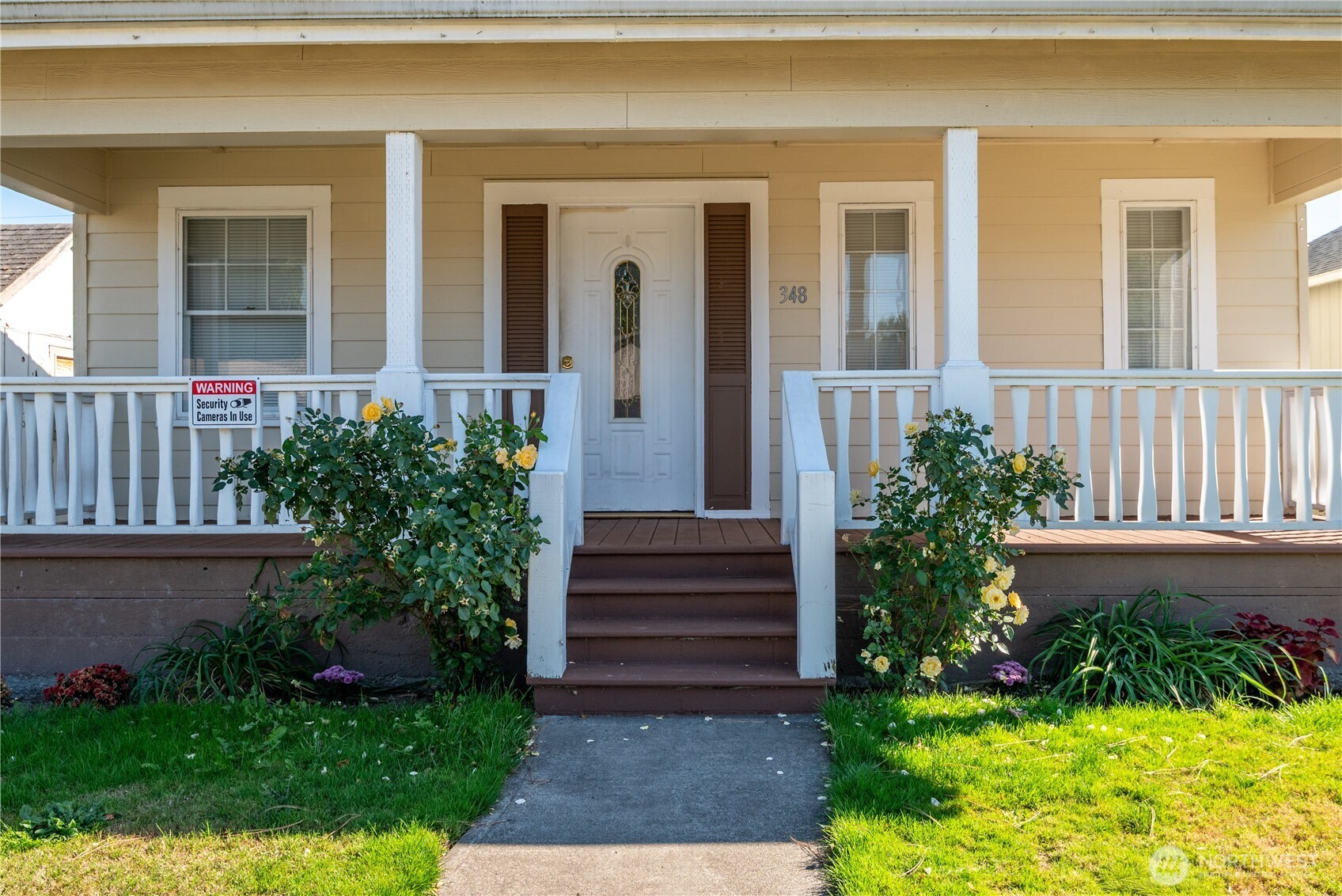 348 22nd Avenue Longview, WA 98632 - Photo 2 of 31 a view of a house with potted plants and a bench
