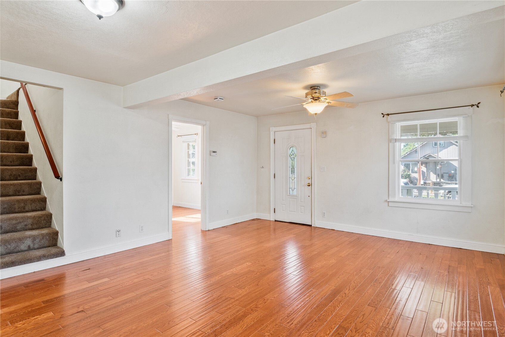348 22nd Avenue Longview, WA 98632 - Photo 7 of 31 wooden floor in an empty room with a window