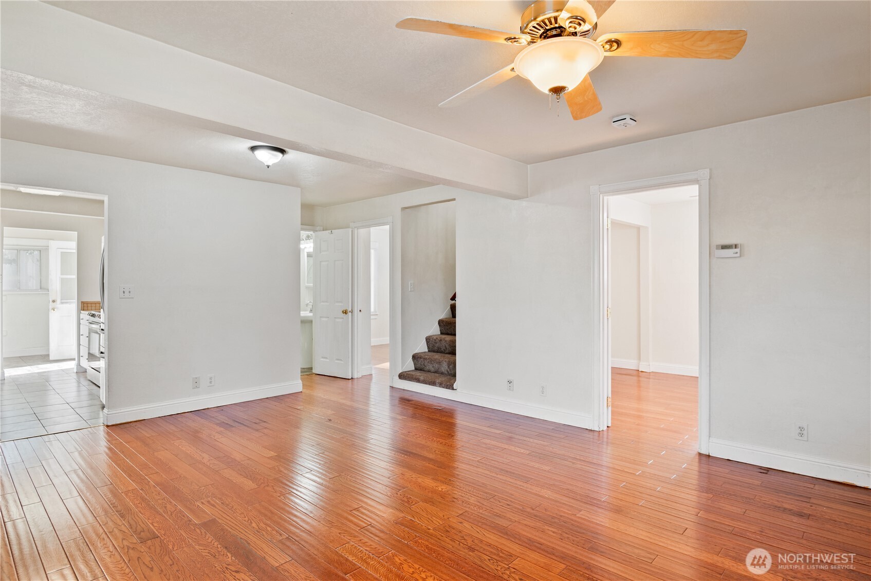 348 22nd Avenue Longview, WA 98632 - Photo 8 of 31 a view of an empty room with wooden floor