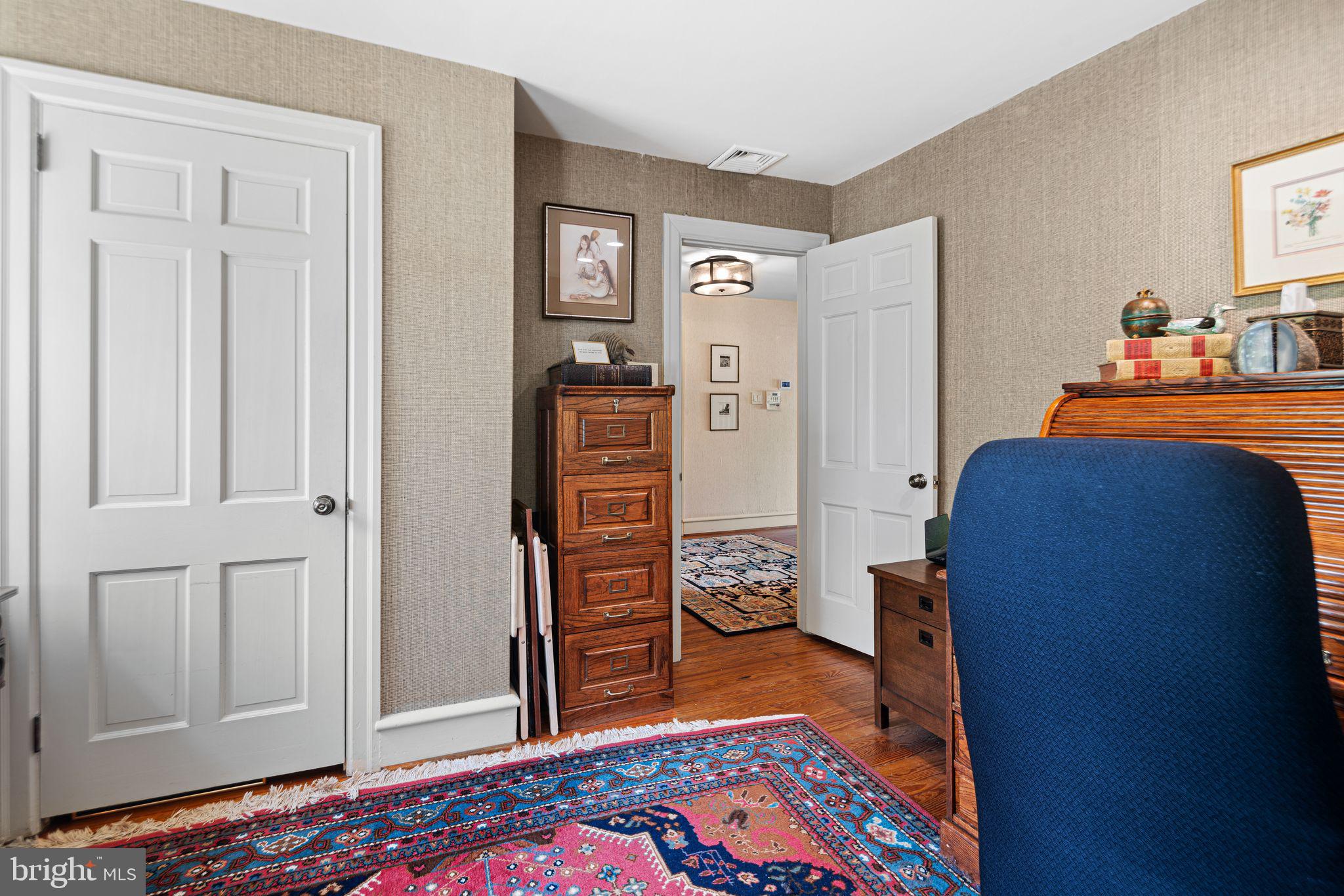 902 Warwick Road Haddonfield, NJ 08033 - Photo 23 of 43 a bedroom with a bed and a dresser