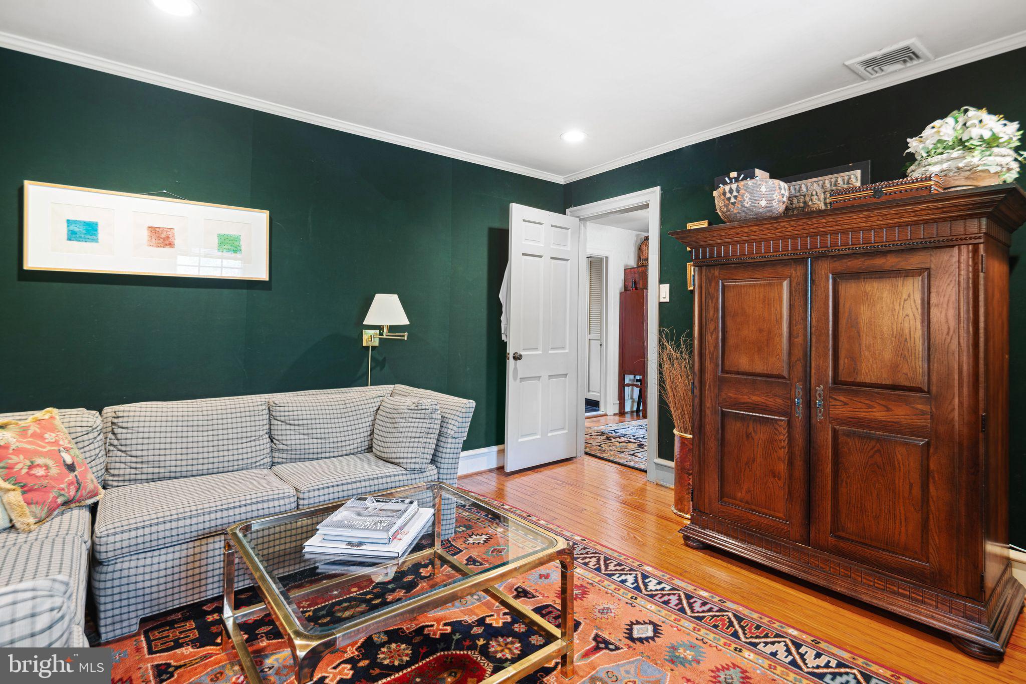 902 Warwick Road Haddonfield, NJ 08033 - Photo 25 of 43 a living room with furniture and wooden floor