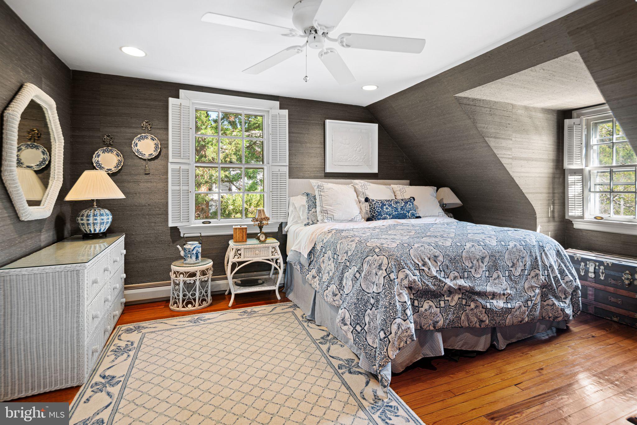 902 Warwick Road Haddonfield, NJ 08033 - Photo 27 of 43 a bedroom with a bed a window and dresser
