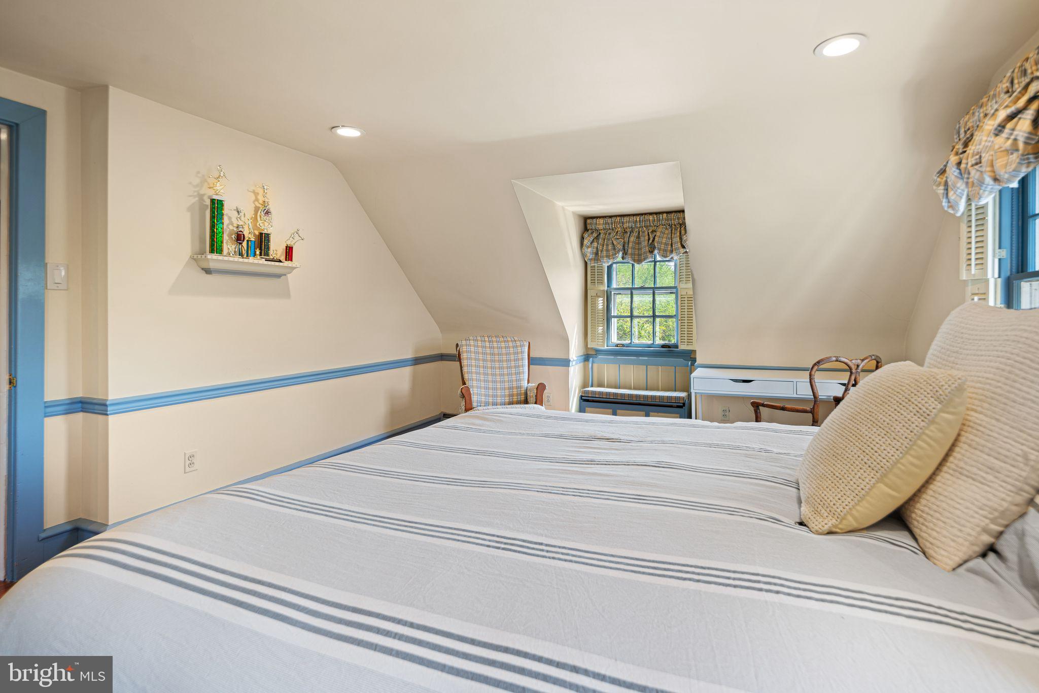 902 Warwick Road Haddonfield, NJ 08033 - Photo 30 of 43 a bedroom with a large bed and a window