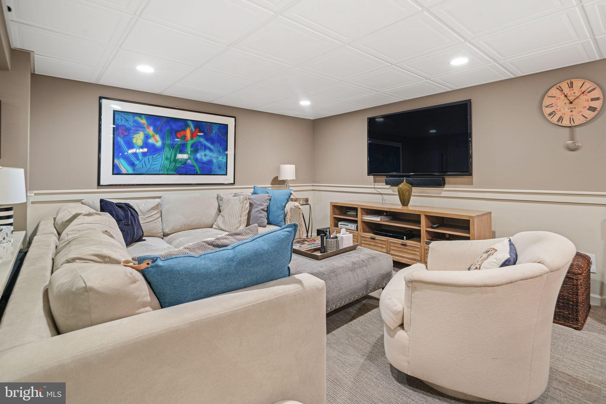 902 Warwick Road Haddonfield, NJ 08033 - Photo 35 of 43 a living room with furniture and a flat screen tv