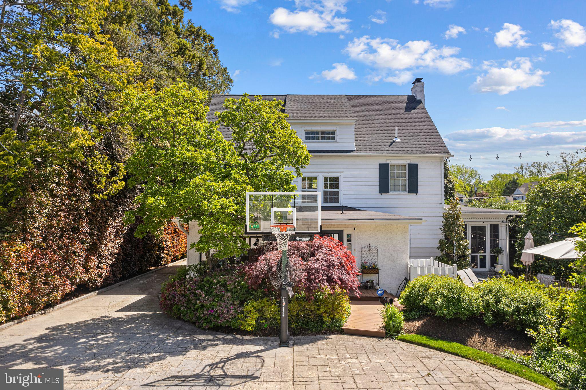 902 Warwick Road Haddonfield, NJ 08033 - Photo 39 of 43 a front view of a house with garden