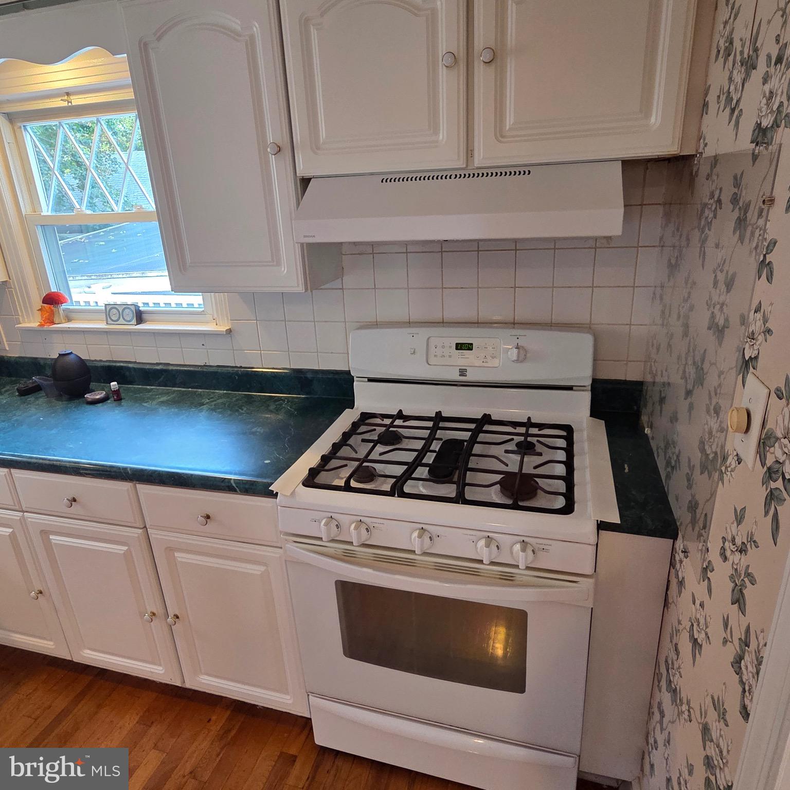 15919 Foundry Row Northwest Mount Savage, MD 21545 - Photo 13 of 41 a stove top oven sitting inside of a kitchen