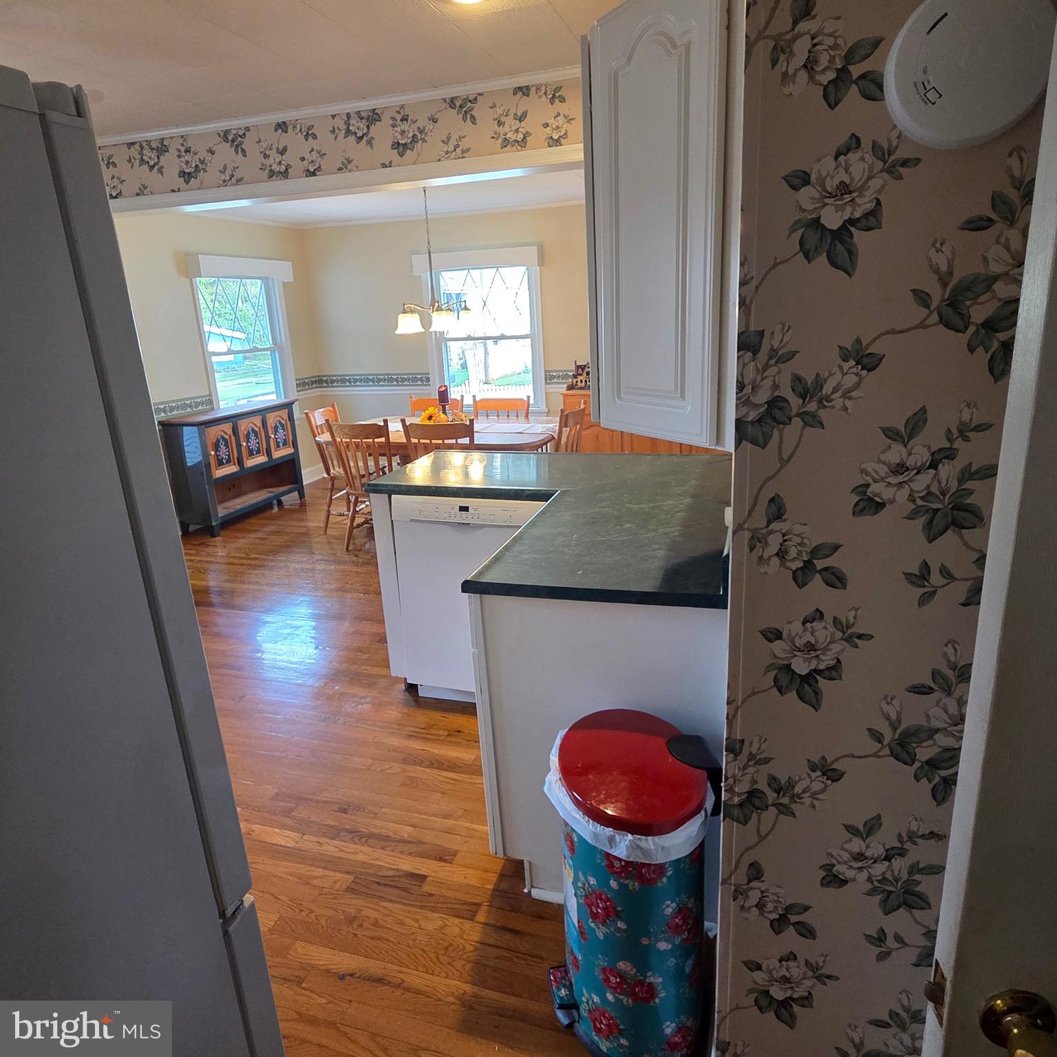 15919 Foundry Row Northwest Mount Savage, MD 21545 - Photo 14 of 41 a bathroom with a granite countertop sink a mirror a vanity and a shower