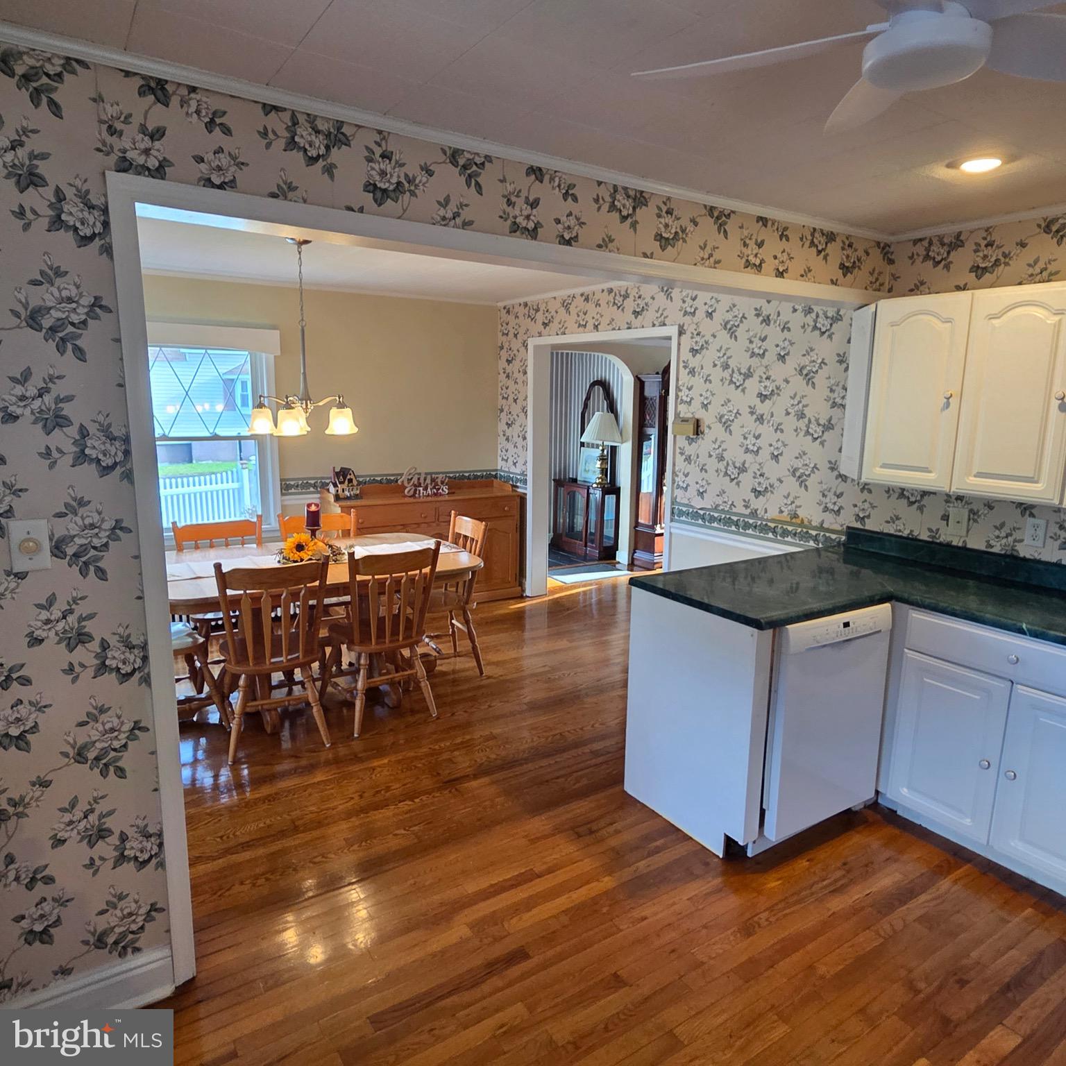 15919 Foundry Row Northwest Mount Savage, MD 21545 - Photo 16 of 41 a kitchen with stainless steel appliances granite countertop a stove and a wooden floors