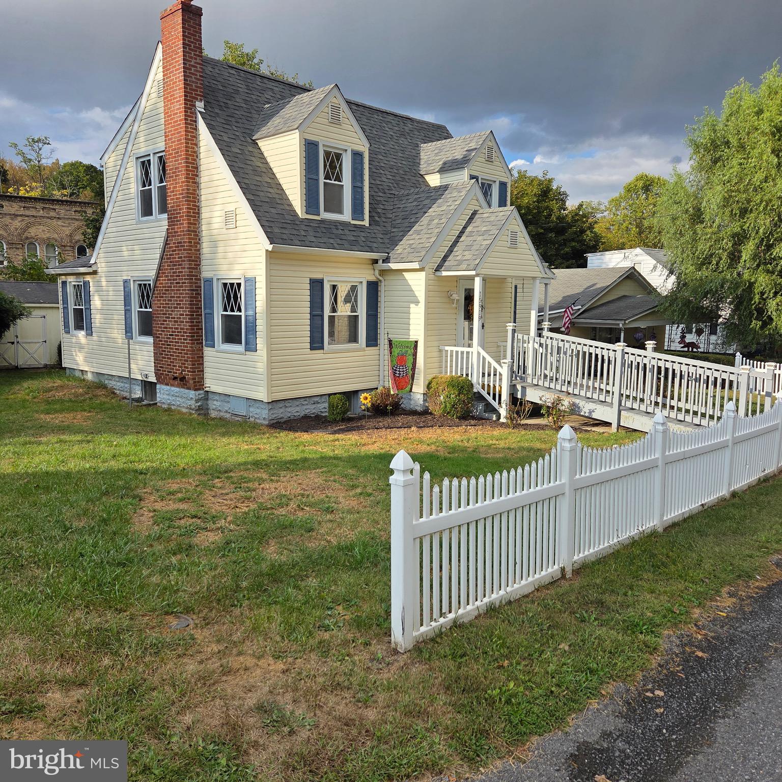 15919 Foundry Row Northwest Mount Savage, MD 21545 - Photo 2 of 41 a front view of a house with a yard